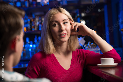 Photo: portrait of a nice woman at the bar portrait of a nice woman at the bar