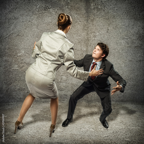 Photo: two businessmen fighting as sumoist two businessmen fighting as sumoist