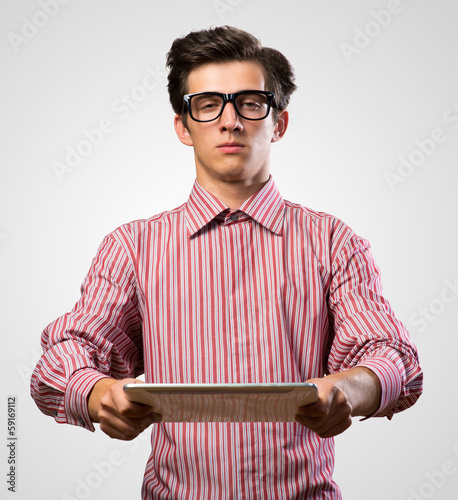 Photo: man with electronic tablet man with electronic tablet