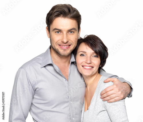 Photo: Closeup portrait of beautiful happy couple - isolated Closeup portrait of beautiful happy couple - isolated