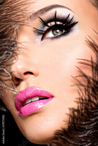 Photo: Beautiful woman with bright professional make-up Beautiful woman with bright professional make-up