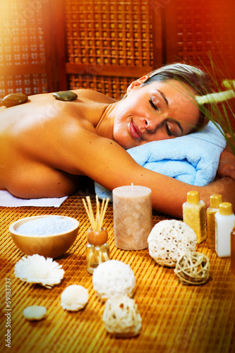 Photo: Beautiful woman having massage. Beautiful woman having massage.