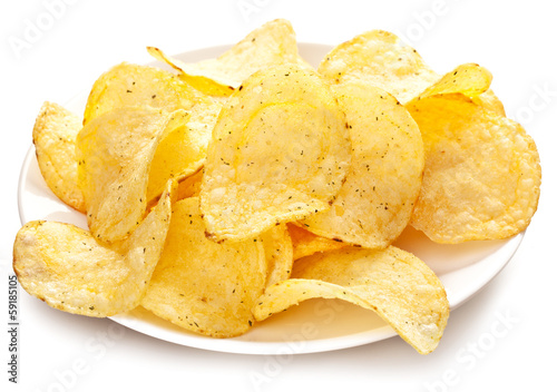 Photo: Potato chips in a bowl. Potato chips in a bowl.