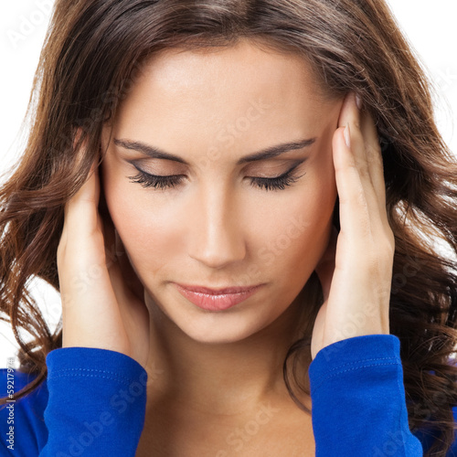 Photo: Thinking, tired or ill with headache young woman Thinking, tired or ill with headache young woman