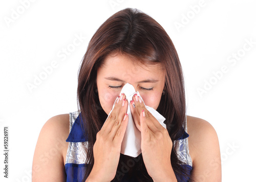 Photo: Woman sneezing Woman sneezing