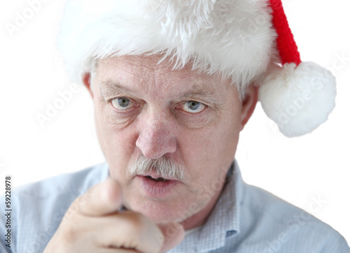 Photo: man in Santa hat is watching you man in Santa hat is watching you