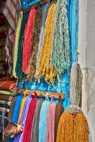 Photo: Marchand de laine dans la médina de Houmt Souk, Djerba - Tunisie Marchand de laine dans la médina de Houmt Souk, Djerba - Tunisie