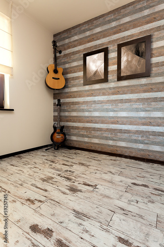 Photo: Urban apartment - guitars in room Urban apartment - guitars in room