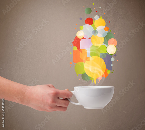 Photo: Tea cup with colorful speech bubbles Tea cup with colorful speech bubbles