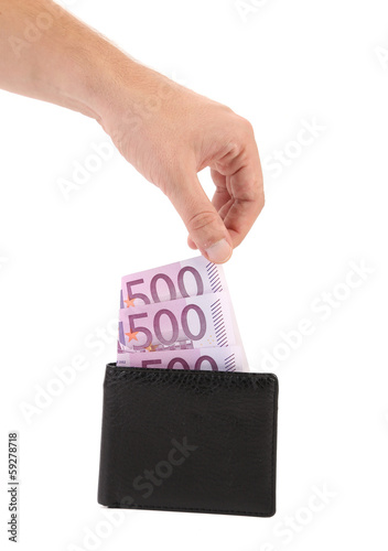 Photo: Five hundred euro in purse and hand. Five hundred euro in purse and hand.