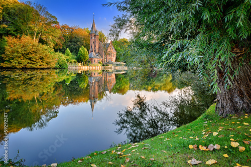 Photo: Autumn landscape with lake and old mansion Autumn landscape with lake and old mansion