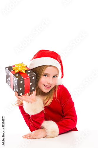 Photo: Christmas Santa kid girl happy excited with ribbon gift Christmas Santa kid girl happy excited with ribbon gift