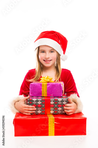 Photo: Christmas Santa kid girl happy excited with ribbon gifts Christmas Santa kid girl happy excited with ribbon gifts