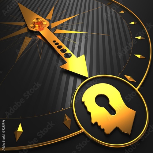 Illustration: Golden Head with a Keyhole Icon on Black Compass. Golden Head with a Keyhole Icon on Black Compass.