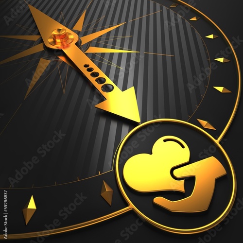 Illustration: Golden Icon of Heart in the Hand on Compass. Golden Icon of Heart in the Hand on Compass.