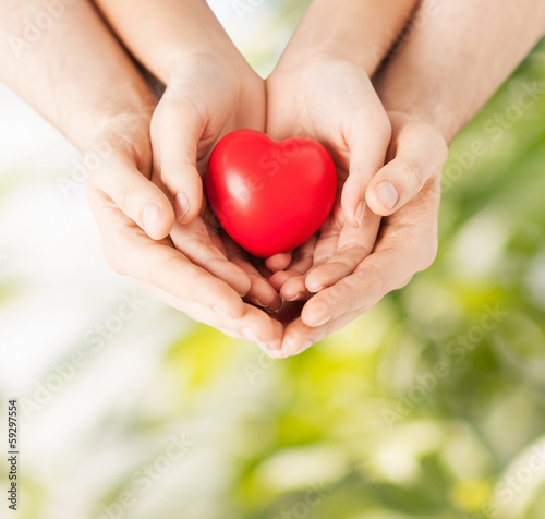 Photo: woman and man hands with heart woman and man hands with heart