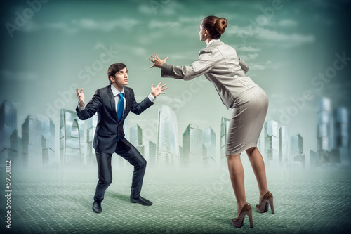 Photo: two businessmen fighting as sumoist two businessmen fighting as sumoist