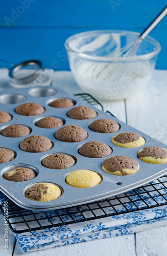 Photo: Fresh cupcakes in baking pan Fresh cupcakes in baking pan