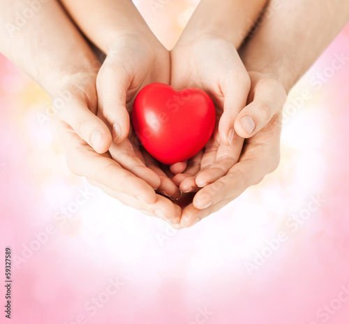 Photo: woman and man hands with heart woman and man hands with heart