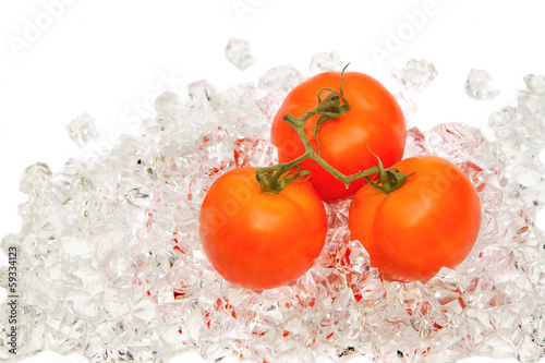 Photo: Fresh tomato on ice Fresh tomato on ice