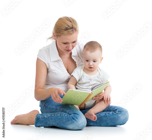 Photo: mother reading a book to her baby son mother reading a book to her baby son