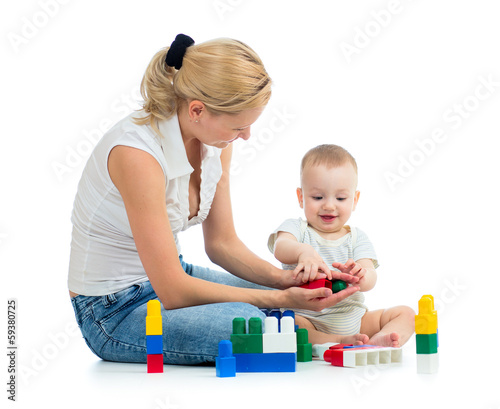 Photo: baby and mother play toys together baby and mother play toys together