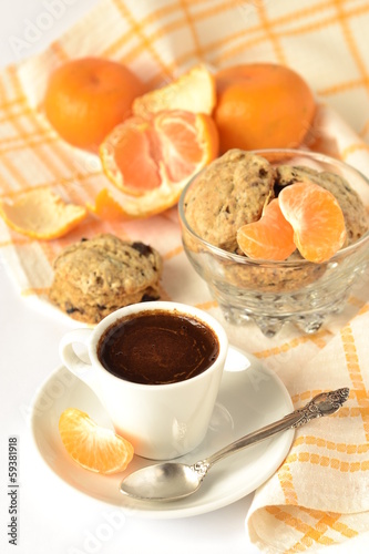 Photo: Delicious morning coffee with cookies and tangerines Delicious morning coffee with cookies and tangerines