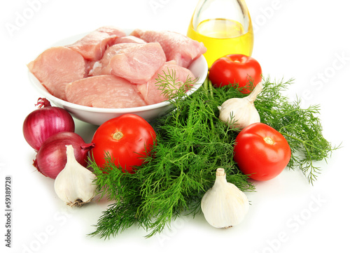 Photo: Raw turkey meat isolated on white Raw turkey meat isolated on white