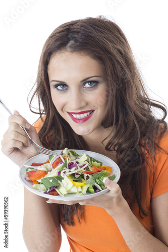 Photo: Young Woman Eating Stir Fried Vegetables Young Woman Eating Stir Fried Vegetables