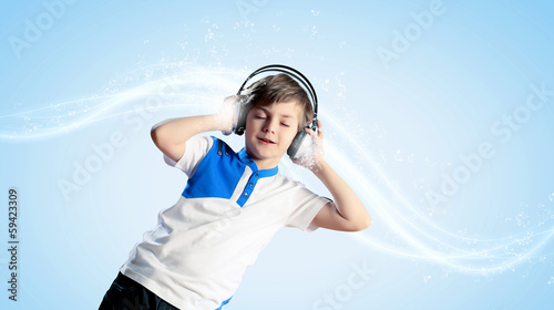 Photo: Little boy in headphones Little boy in headphones