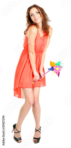 Photo: Beautiful young girl in dress isolated on white Beautiful young girl in dress isolated on white