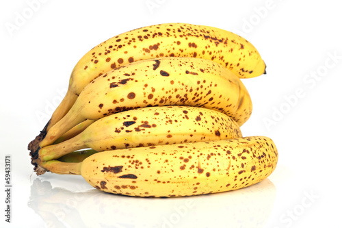 Photo: Banane mit braunen Punkten Banane mit braunen Punkten