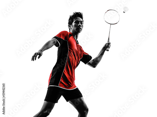 Photo: badminton player young man silhouette badminton player young man silhouette