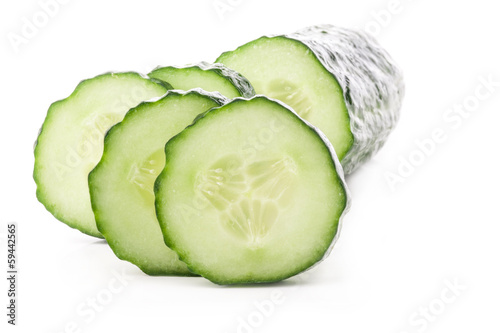 Photo: Cucumber slices isolated on white background Cucumber slices isolated on white background