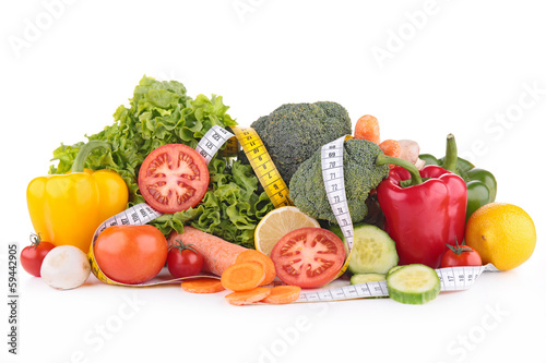 Photo: assortment of vegetable and measuring tape assortment of vegetable and measuring tape