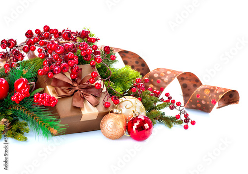 Photo: Christmas Decorations and Gift Box Isolated on White Christmas Decorations and Gift Box Isolated on White