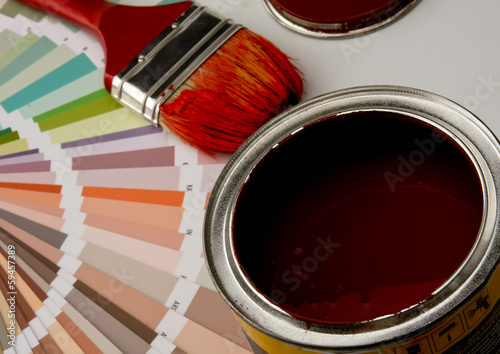 Photo: Close-up of a color palette and a brush on white background Close-up of a color palette and a brush on white background