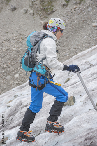 Photo: Girl climb up on the ice Girl climb up on the ice