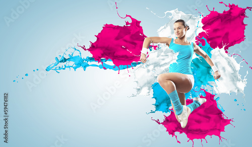 Photo: Image of sport woman jumping Image of sport woman jumping
