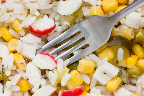 Photo: Fork in a crab salad Fork in a crab salad