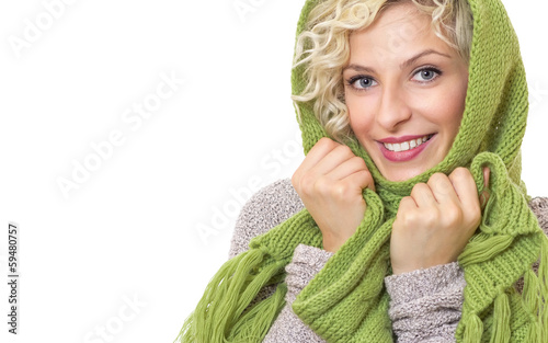 Photo: Female wrapped with wool scarf and cap Female wrapped with wool scarf and cap