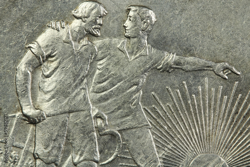Photo: Old silver coin closeup Old silver coin closeup