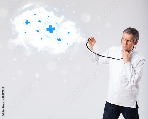 Photo: Doctor listening to abstract cloud with medical signs Doctor listening to abstract cloud with medical signs