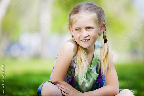 Photo: Little girl in park Little girl in park