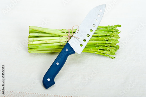 Photo: fresh asparagus over white fresh asparagus over white