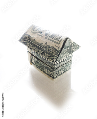 Photo: dollar house on white dollar house on white
