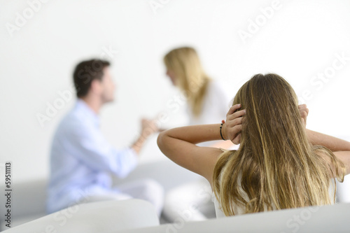 Photo: Little girl tired of earing her parents yelling at each other Little girl tired of earing her parents yelling at each other