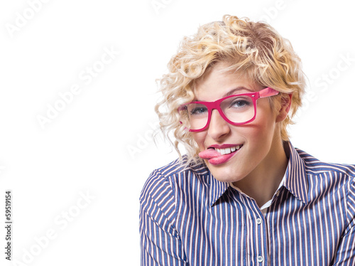 Photo: Woman sticking out tongues and mocking each Woman sticking out tongues and mocking each