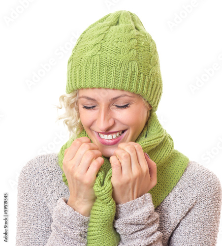 Photo: Laughing woman wearing warm - winter clothing Laughing woman wearing warm - winter clothing