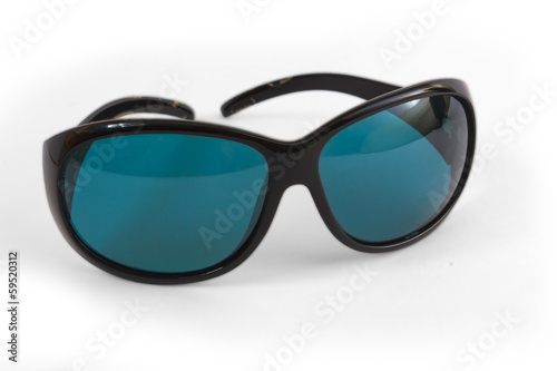 Photo: blue sunglasses spectacles sun isolated on white blue sunglasses spectacles sun isolated on white
